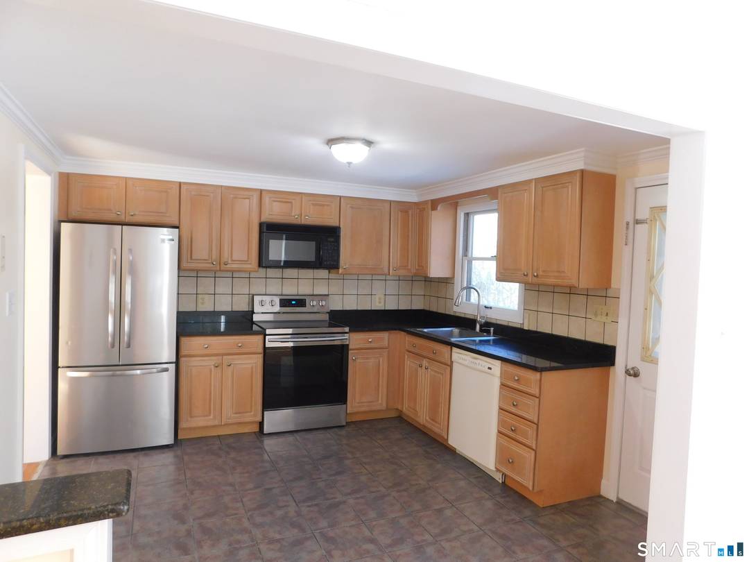 Tucked into a quiet, sought after neighborhood, this charming 5 Bedroom raised ranch offers 2, 497 Total square feet of living space on a beautifully manicured lot.