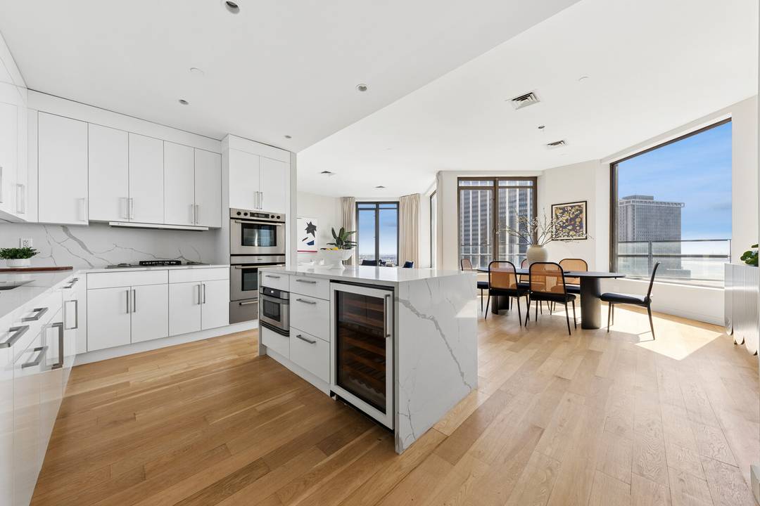 Perched on a high floor, this exceptional penthouse offers nearly 2, 500 square feet of thoughtfully designed living space, showcasing breathtaking southern exposure with sweeping views of the river and ...
