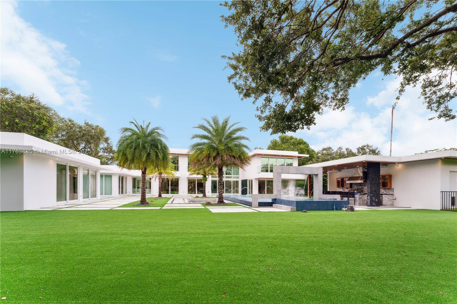 Resort style living on a Pinecrest Acre lot, PERFECTION.