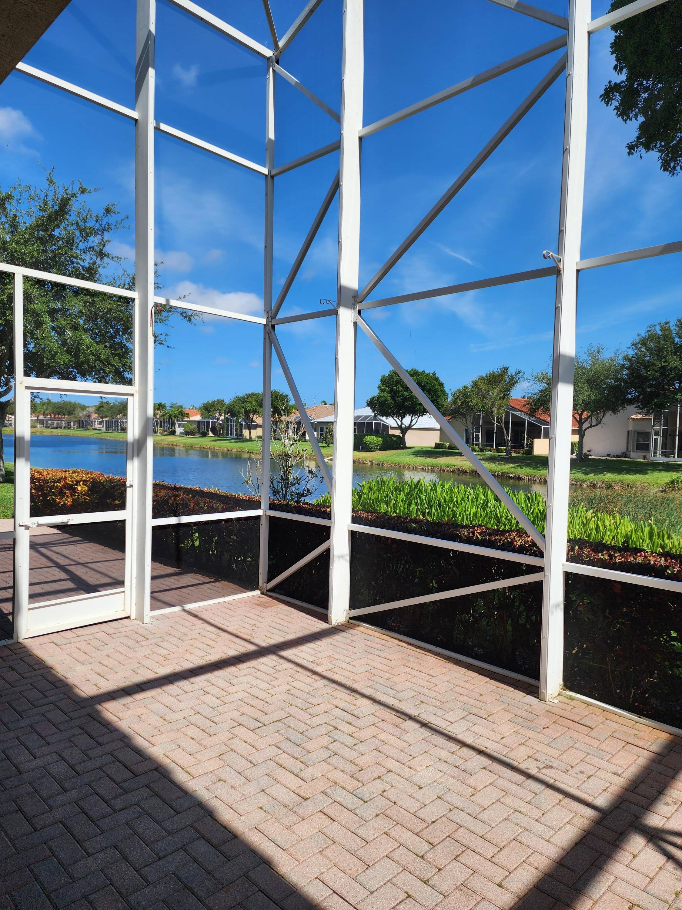 This unique lake lateral home offers serene water views from the entire back of the house.