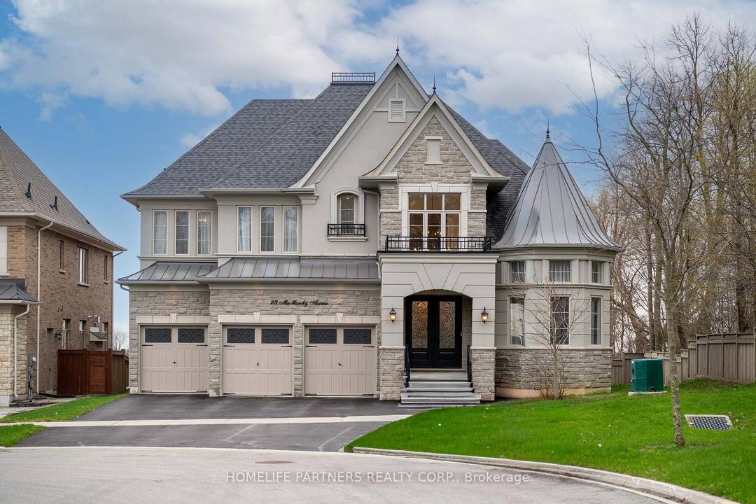 This exquisite estate is set at the end of a private cul de sac backing onto green space, with a 75' south facing lot across from a forested walking trail.