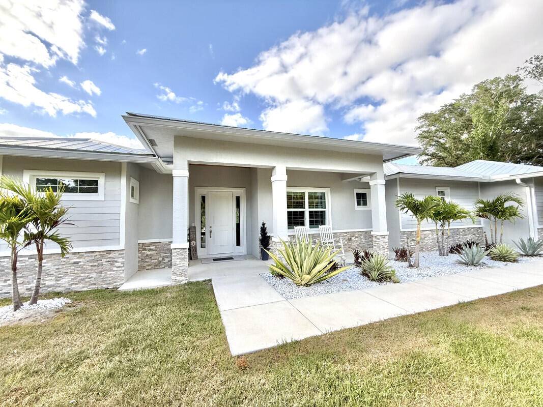 Discover a tranquil waterfront property located in Indiantown, Florida on the St.