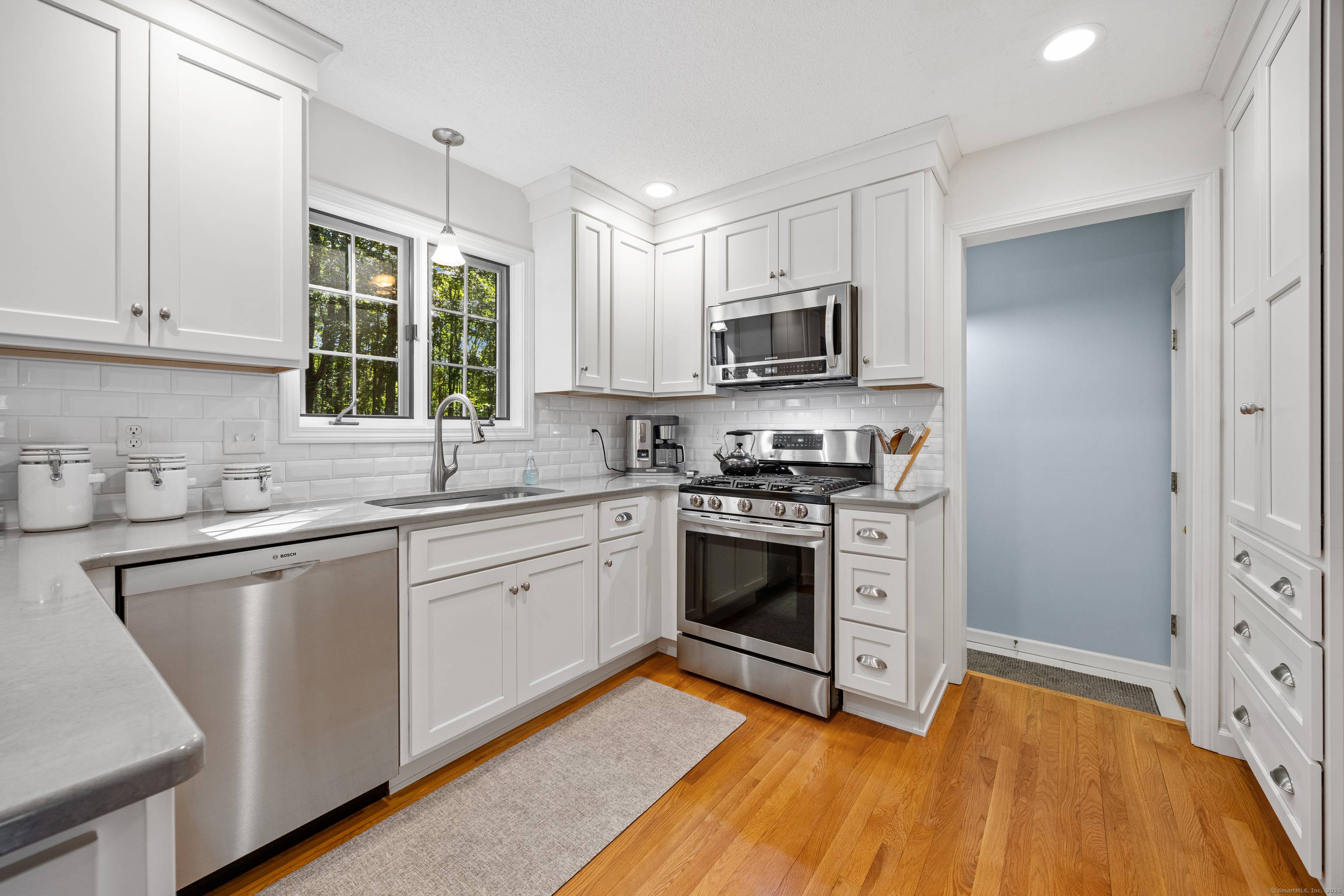 Situated on a generous 2 acre parcel on a quiet cul de sac street, this meticulously maintained Colonial exemplifies quality modern features.