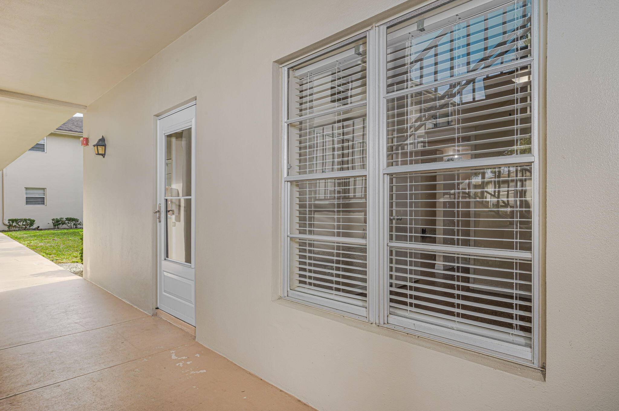 AMAZING DEAL on this 2 2, FIRST FLOOR, CORNER UNIT in Vista St Lucie, a 55 community in desirable Port St Lucie !