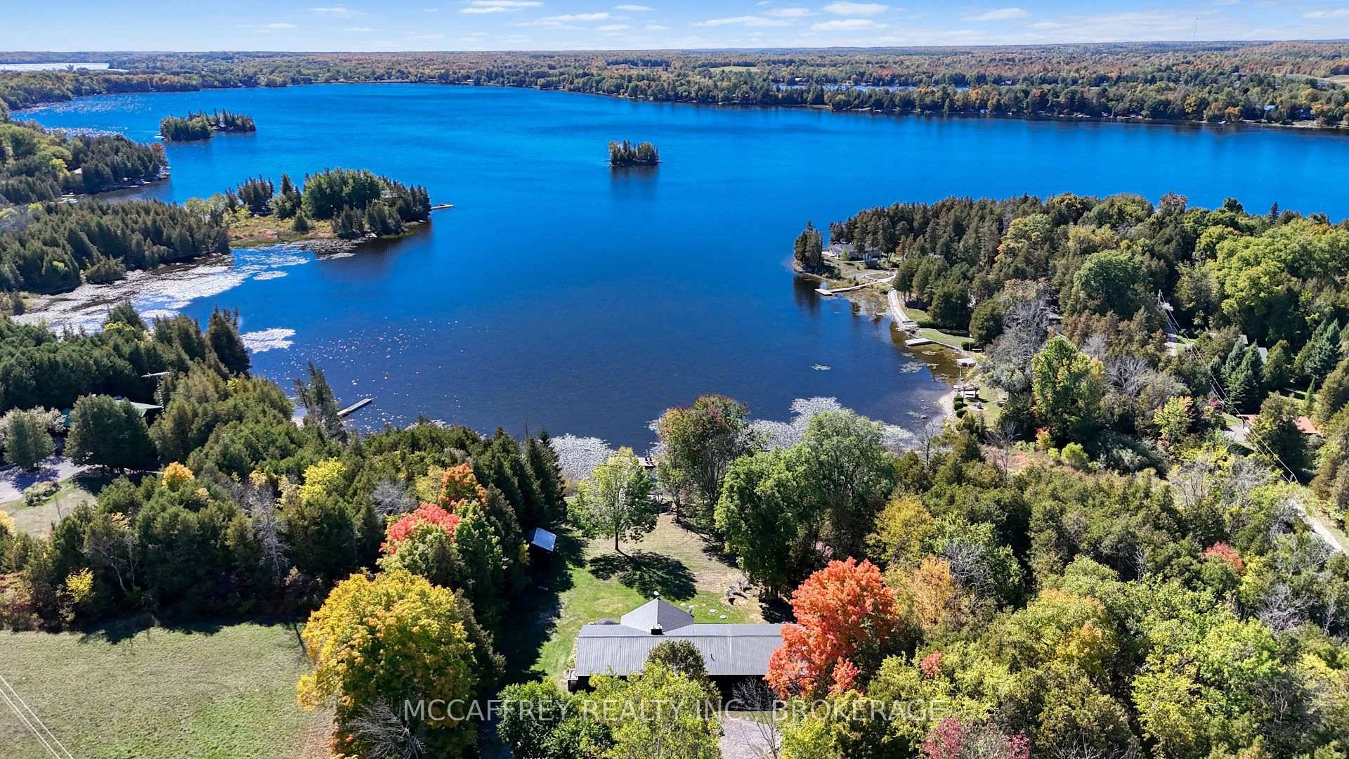 Welcome to your private lakefront sanctuary where elegance, scale, and serenity meet.