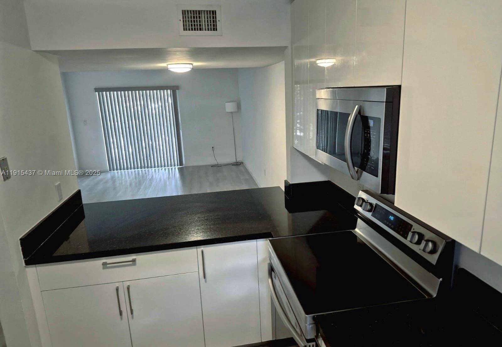 Discover this beautiful, fully remodeled, two story duplex condominium in the heart of West Hialeah.