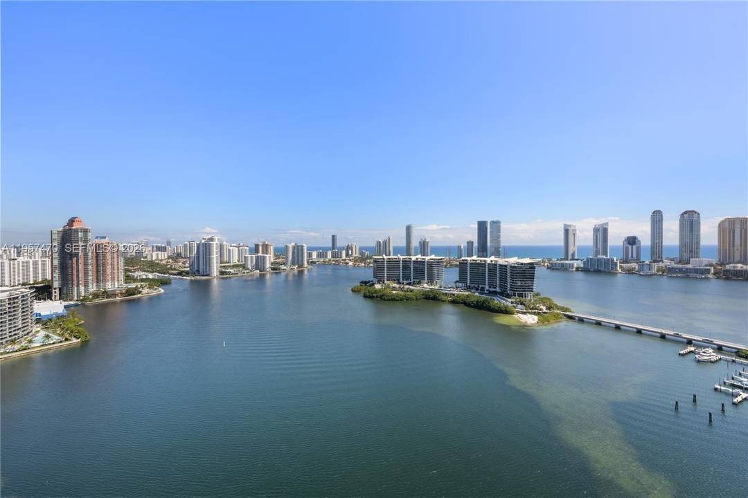 LUXURY RESIDENCE FEATURING PRIVATE ELEVATOR ENTRY AND BREATHTAKING OCEAN, INTRACOASTAL AND CITY VIEWS AT PRESTIGIOUS PENINSULA I.