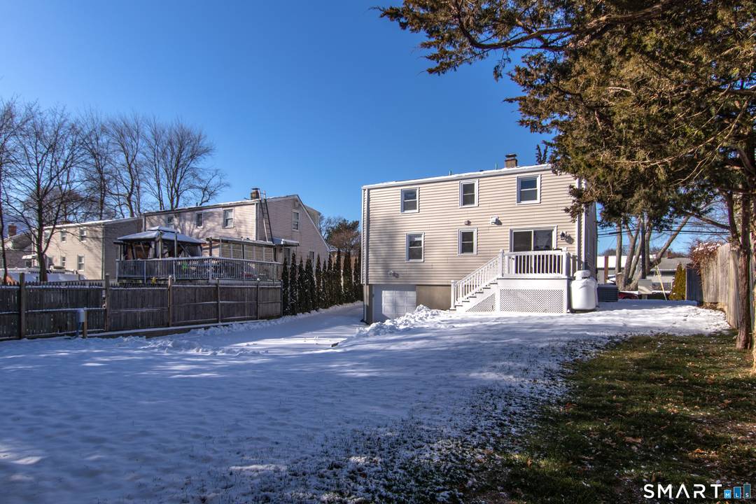 Charming on the outside exceptional on the inside, this completely renovated Cape Cod is set on a spacious, level, and lush property in Norwalk's highly sought after William Street neighborhood.