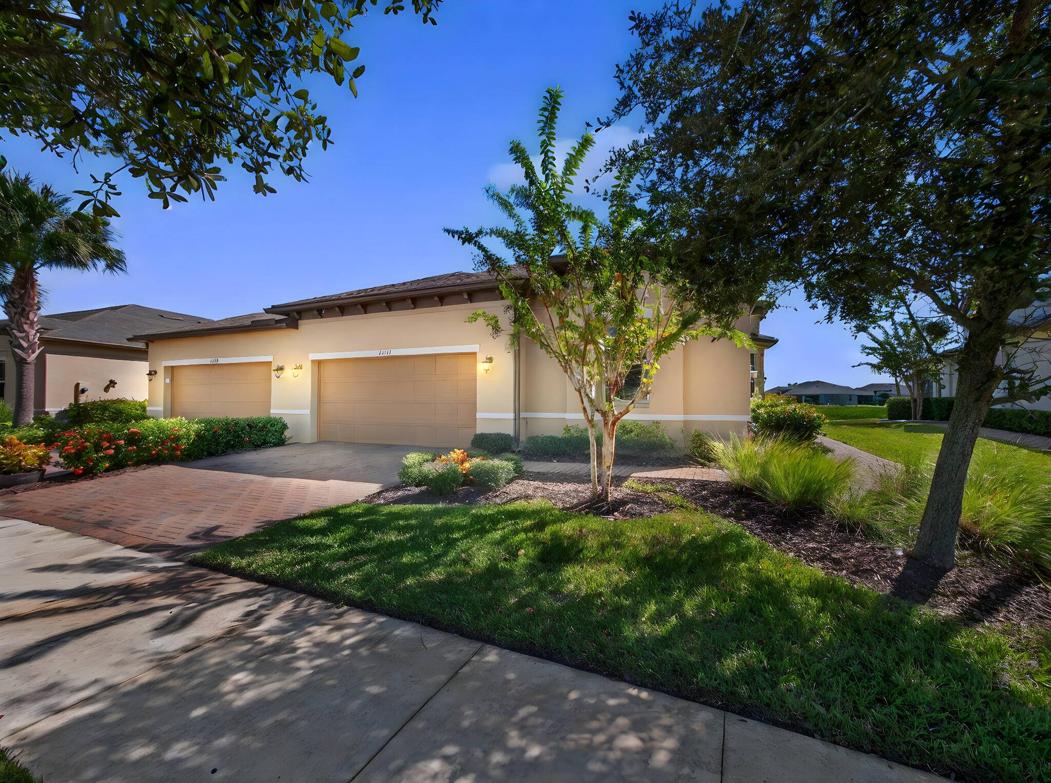 Set on a unique lot with stunning lakefront and preserve views, this 2 bedroom den, 2 bath Banyan villa offers the ideal blend of comfort, convenience, and modern upgrades.