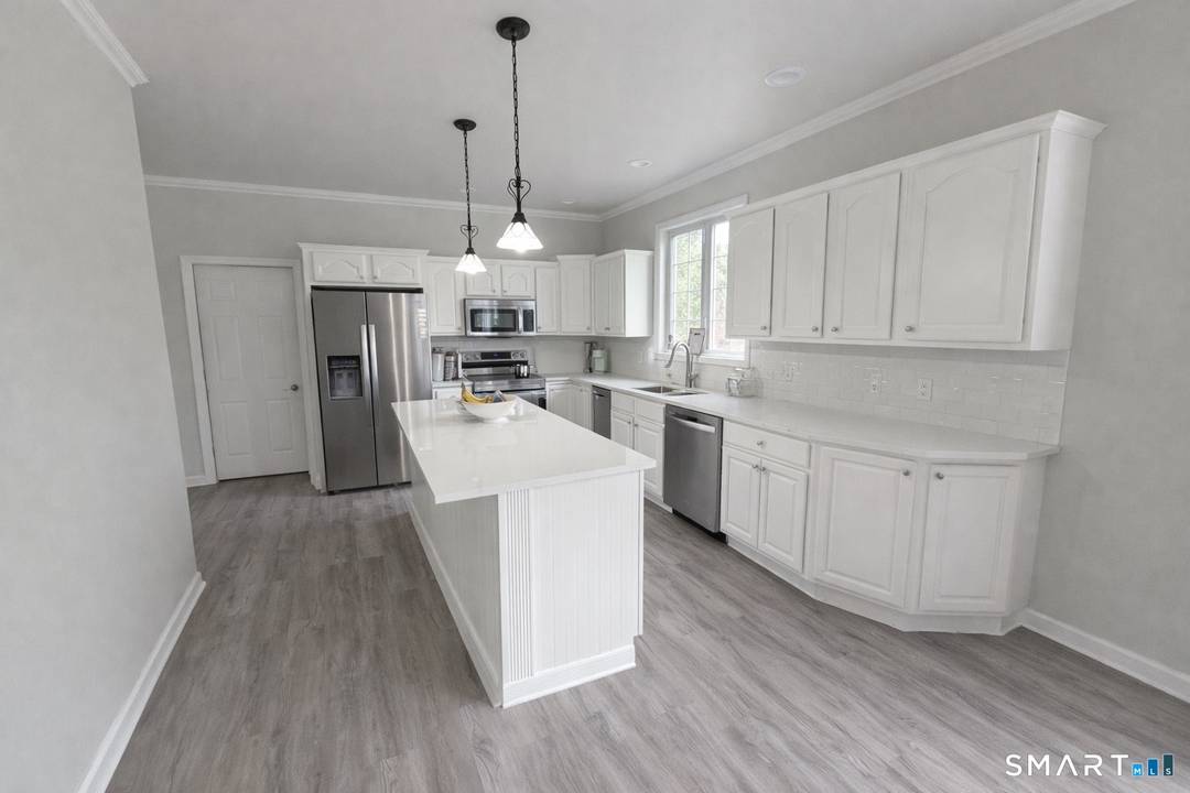Welcome to 240 Tom Swamp Road, a rare opportunity to own a spacious and private home in one of Hamden's most sought after locations.