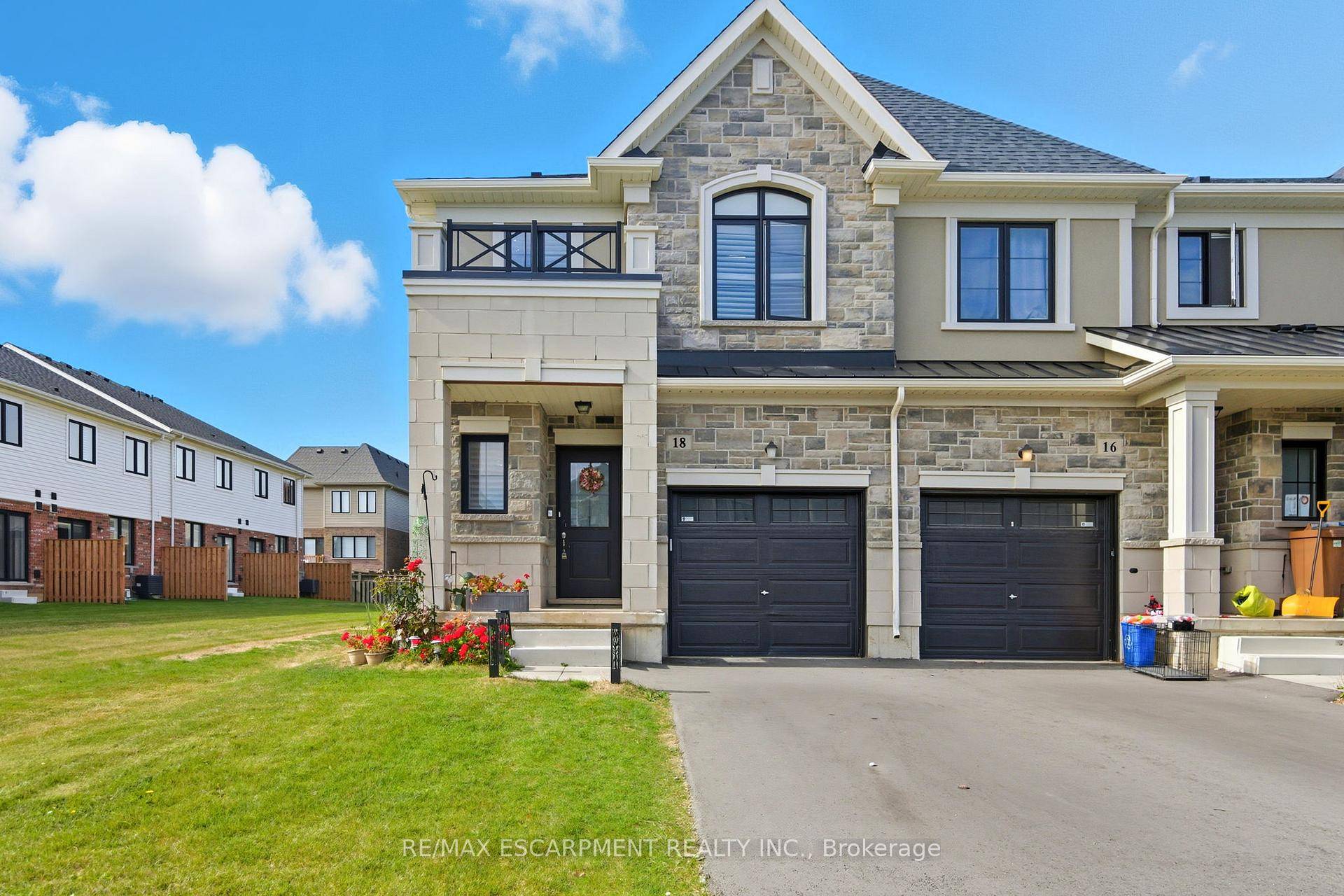 Discover modern living in this stunning two storey end unit townhome, built in 2023 and loaded with upgrades.