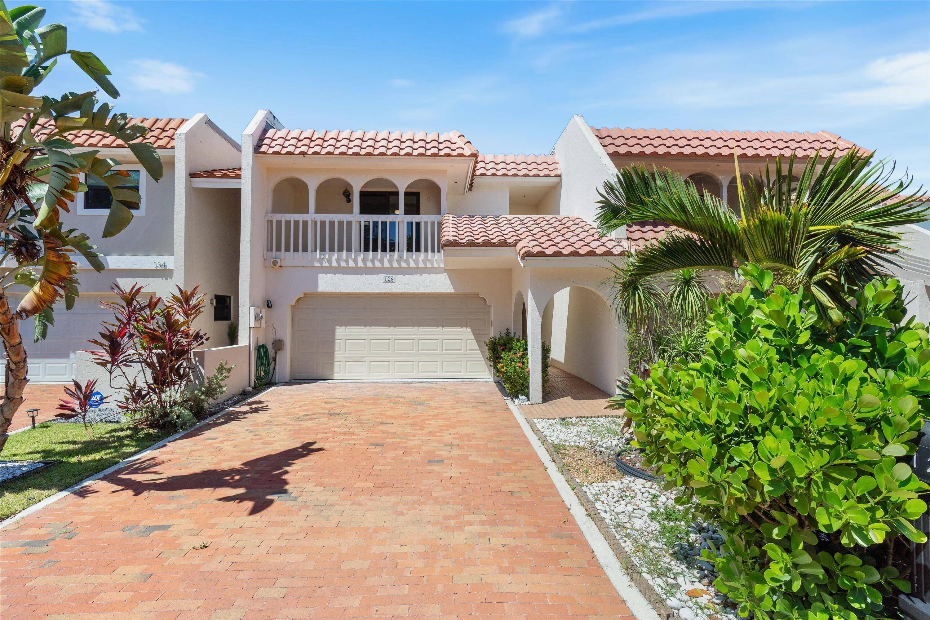 Boater's Paradise ! Live the dream in this rare 3 bed, 3 bath gem tucked inside one of Delray Beach's most exclusive waterfront communities.