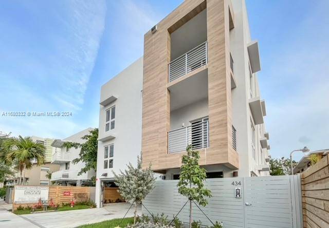 West Brickell Town Homes is a luxurious development featuring five townhomes, each spanning three stories with 3 bedrooms, 2.