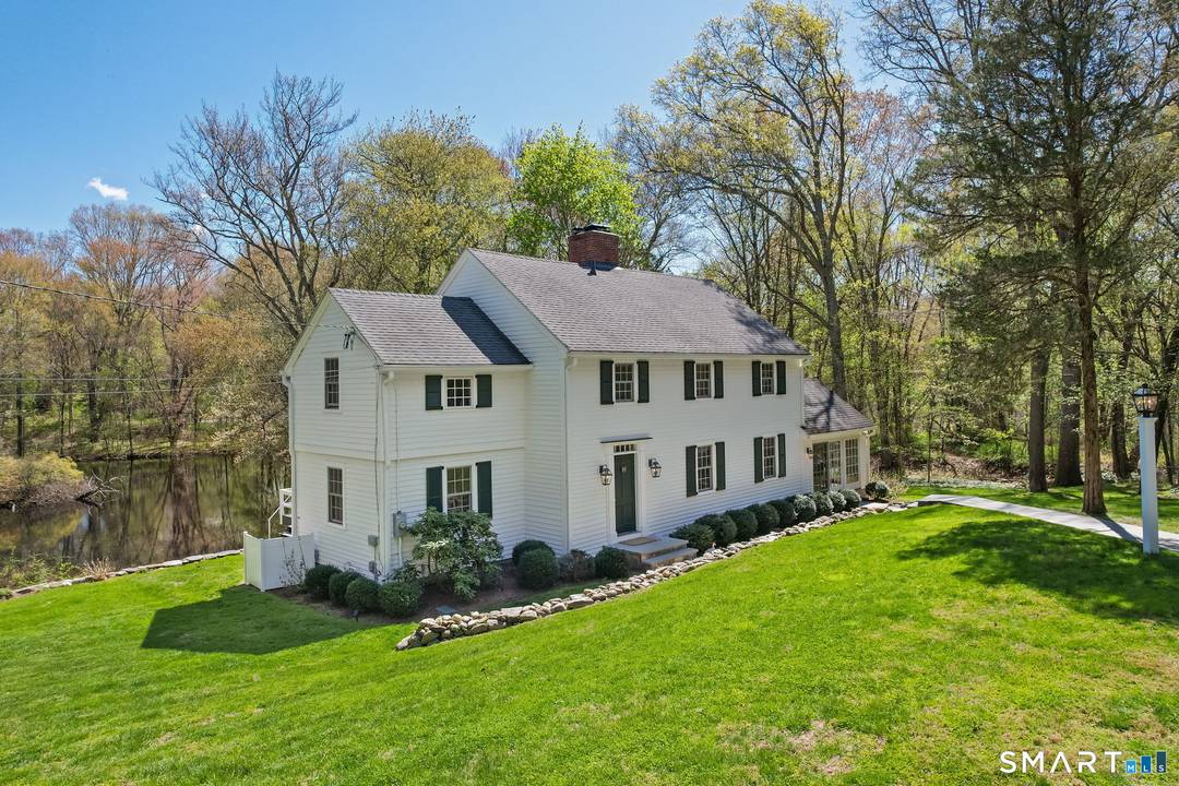 Tucked away at the end of a long private drive, this exceptional property offers rare privacy just minutes from everything Westport has to offer.