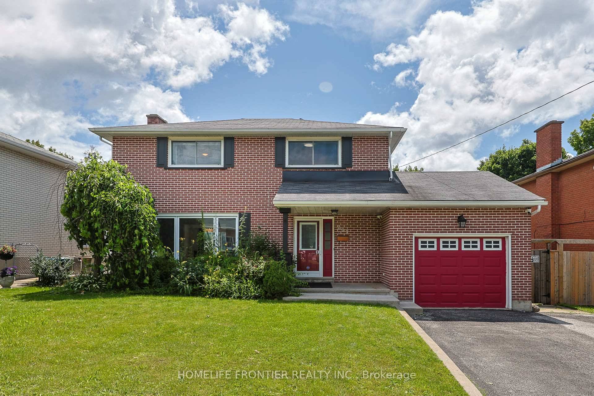 Introducing an exquisite all brick 2 story home, nestled in the highly sought after Grove East community !