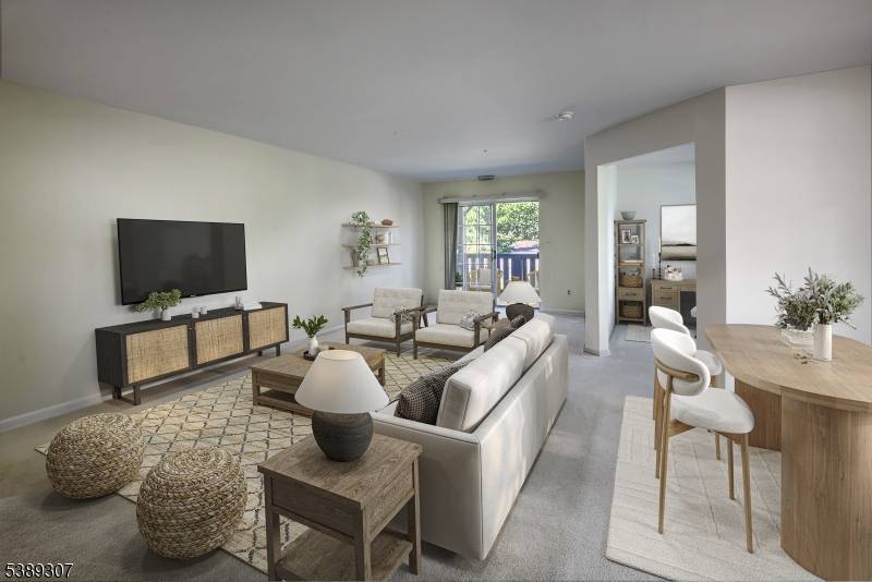 Sought after first floor end unit at The Village at Convent Station.