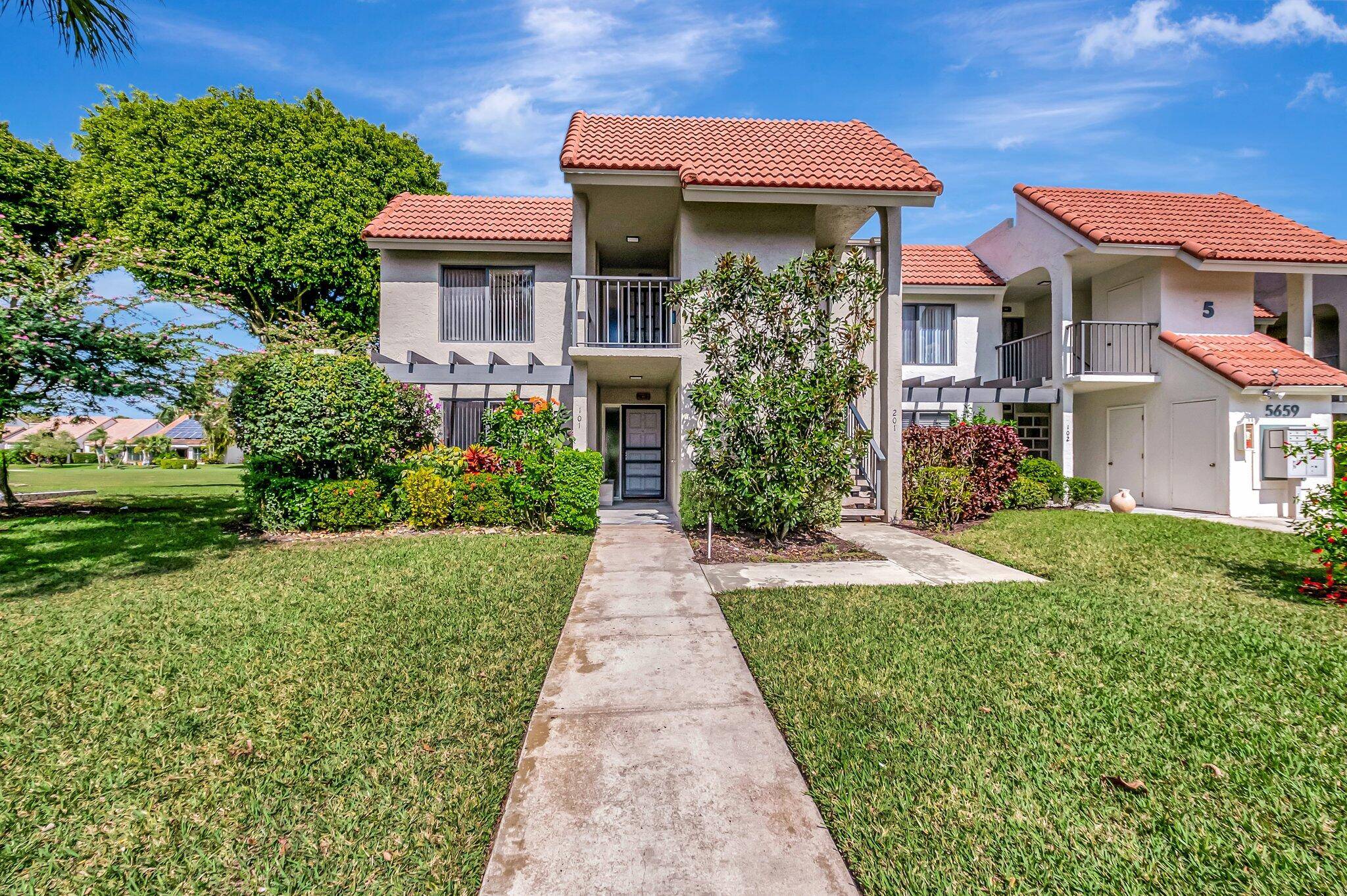This beautifully renovated corner unit offers a serene, first floor location with breathtaking golf course views.