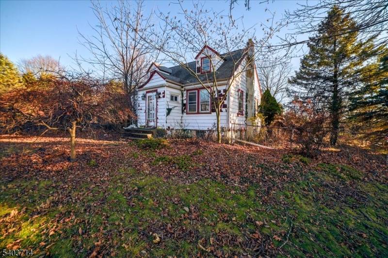 Four bedroom Cape Cod situated on approximately 0.