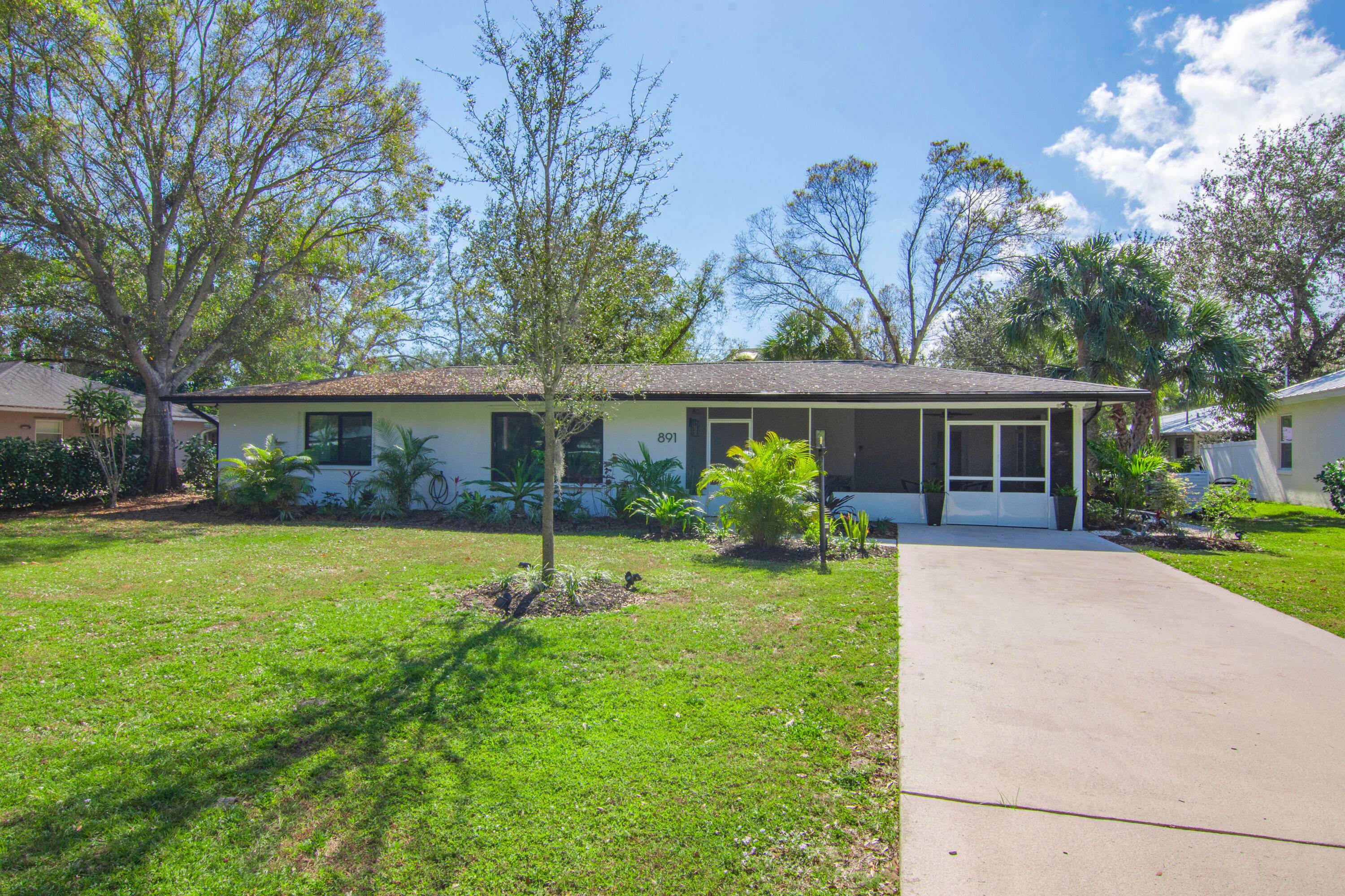 True MID CENTURY with some modern updates in the Vero Beach Country Club area.