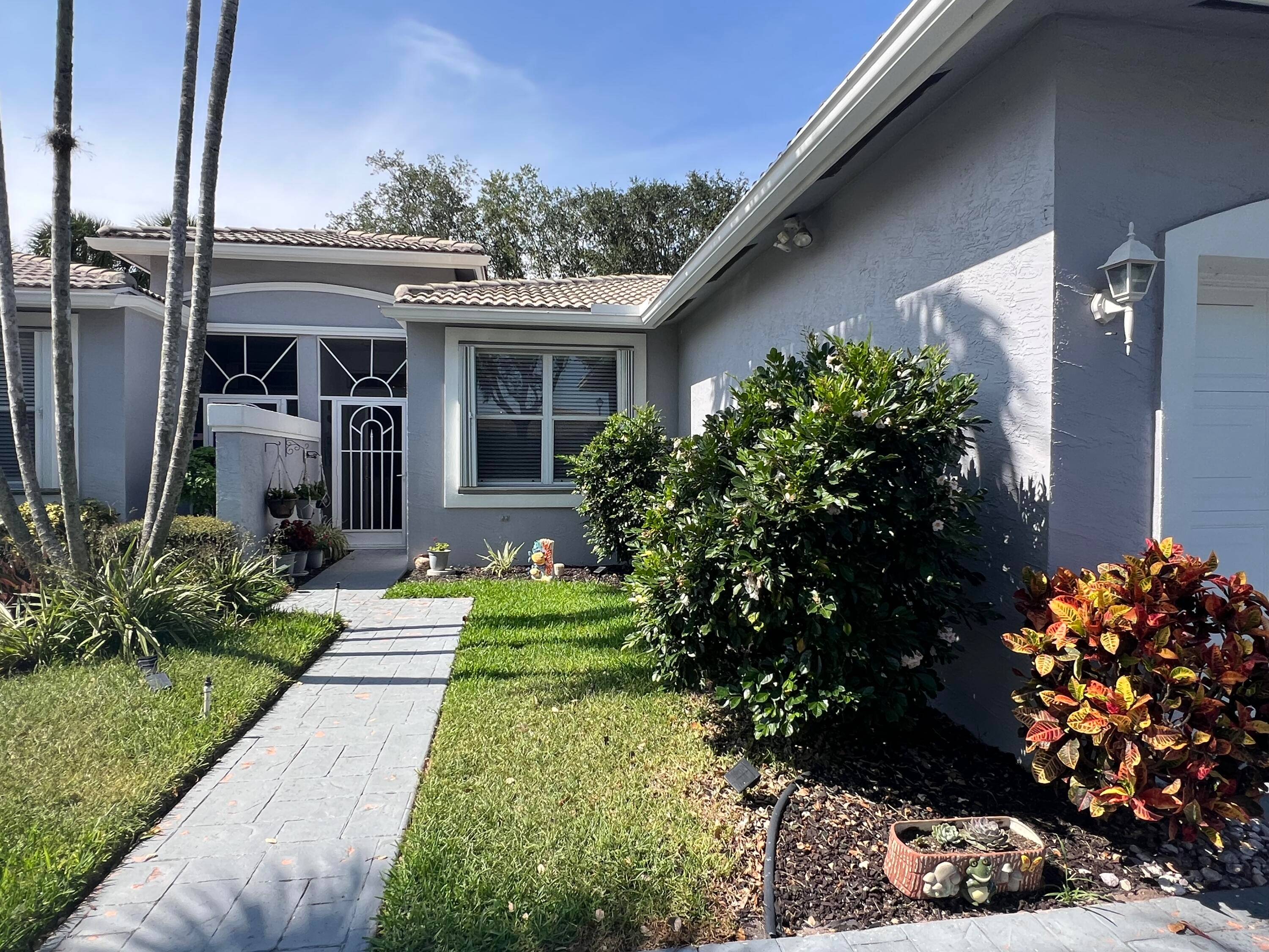 This 3 bedroom 2 bath villa is light and bright in a fabulous community.