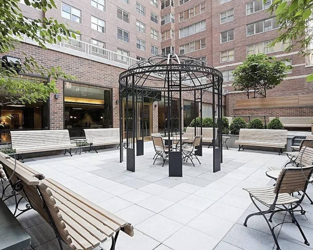 Welcome to this stunning high floor Junior 4 at the highly coveted 360 East 72nd Street.