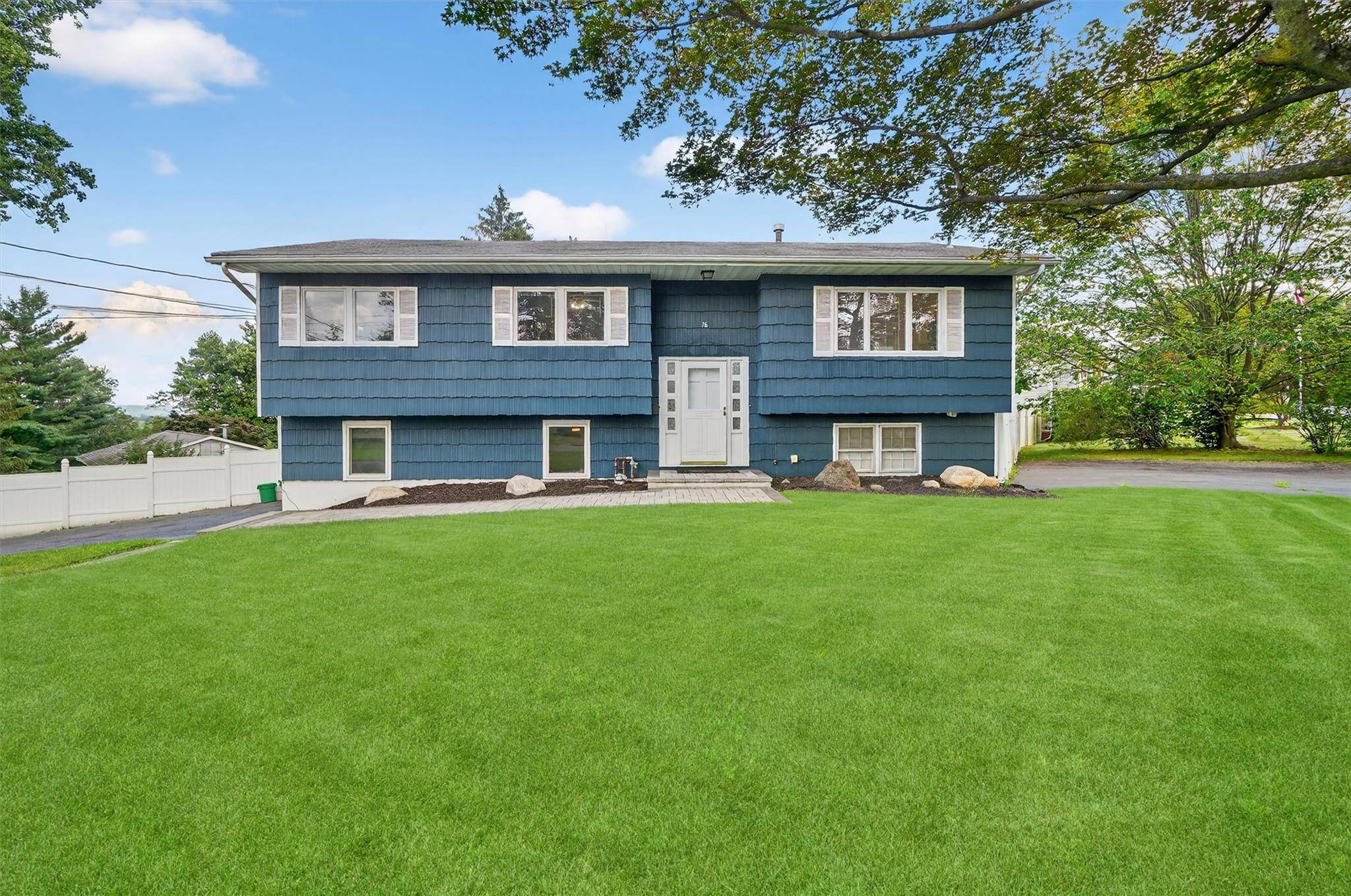 Welcome to 76 Amundsen Lane, a stunning renovated home in the desirable hamlet of New City.