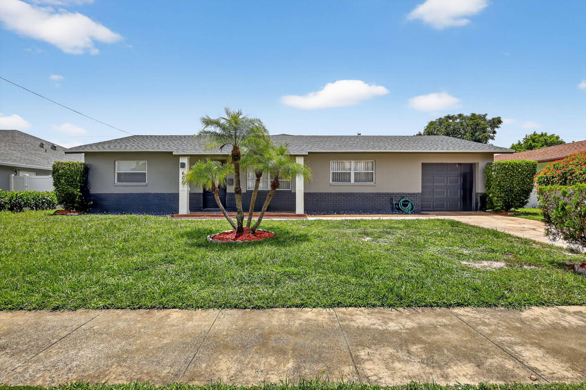 Welcome to this beautifully renovated single family home in the heart of West Palm Beach, located in the desirable Roosevelt Estates neighborhood.
