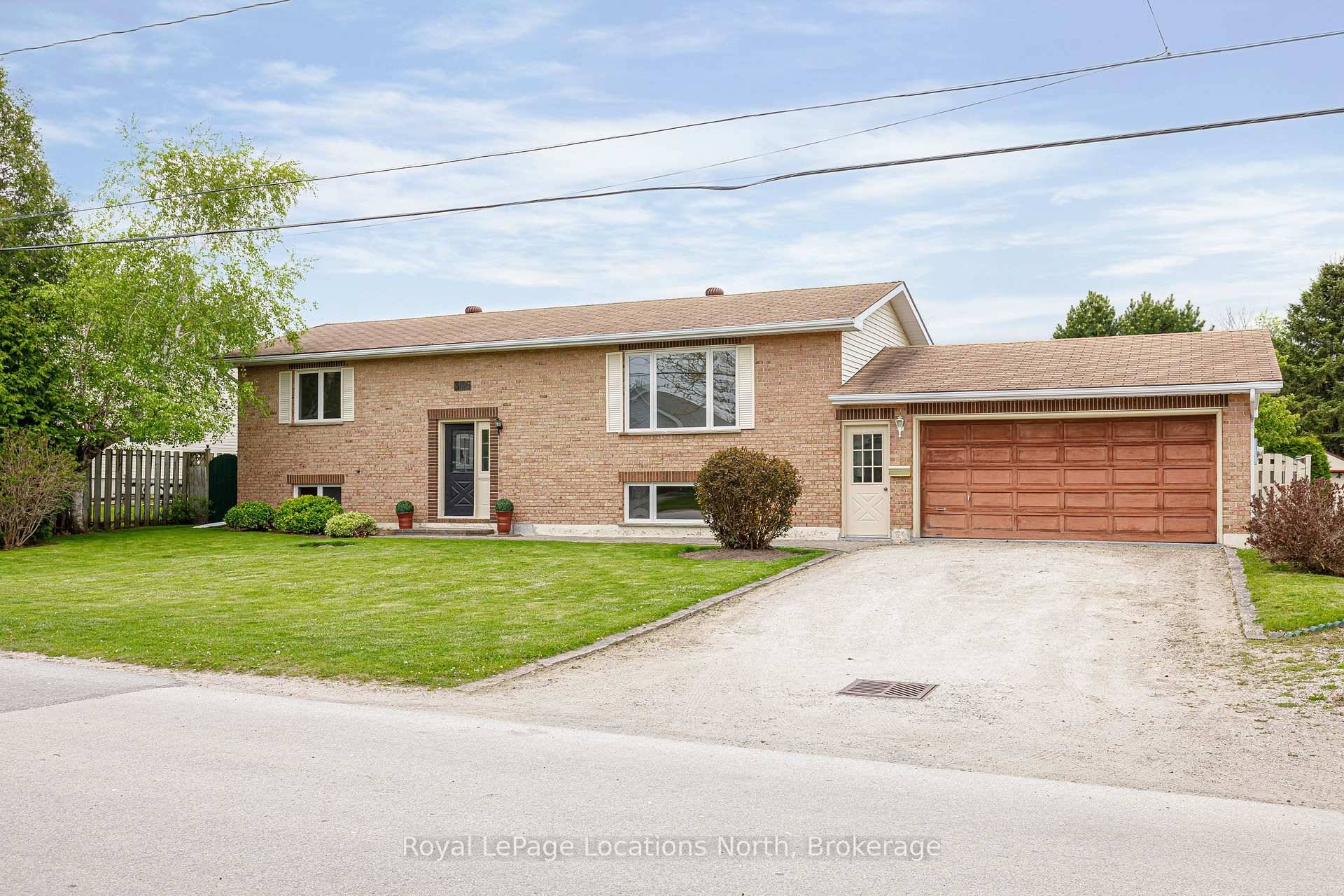 Nestled in the heart of Collingwood is this charming well built and well maintained raised brick bungalow !