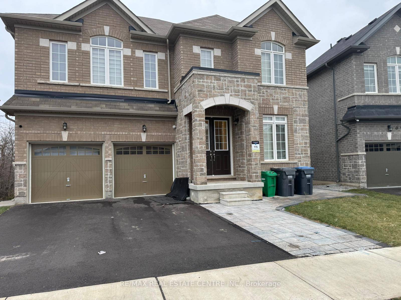 Less than 2 years old detached home featuring separate living and family rooms.