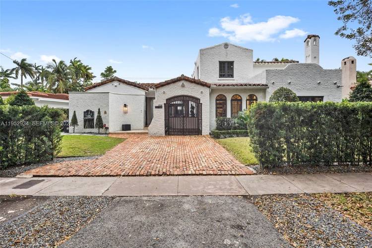 Introducing 1236 Obispo Ave, a luxurious haven nestled in the heart of Coral Gables.