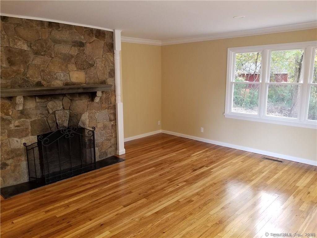 Well maintained three bedrooms single family home with 2 fireplaces partially finished basement with walk out.