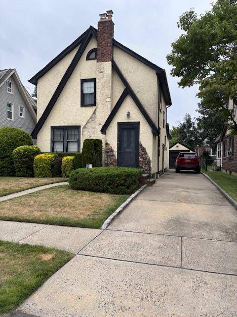 Welcome To This Charming Tudor Style Home Located In The Heart Of Lynbrook.