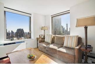 Stunning panoramic views to the south and east grace this two bedroom, two bathroom apartment in close proximity to Bryant Park.