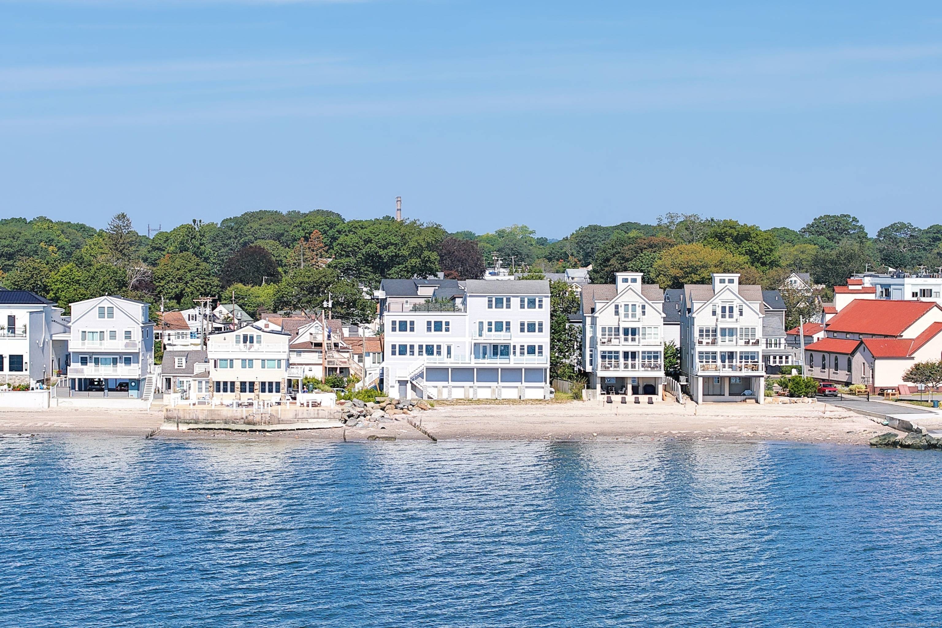 Beachfront Luxury with Panoramic Water Views !