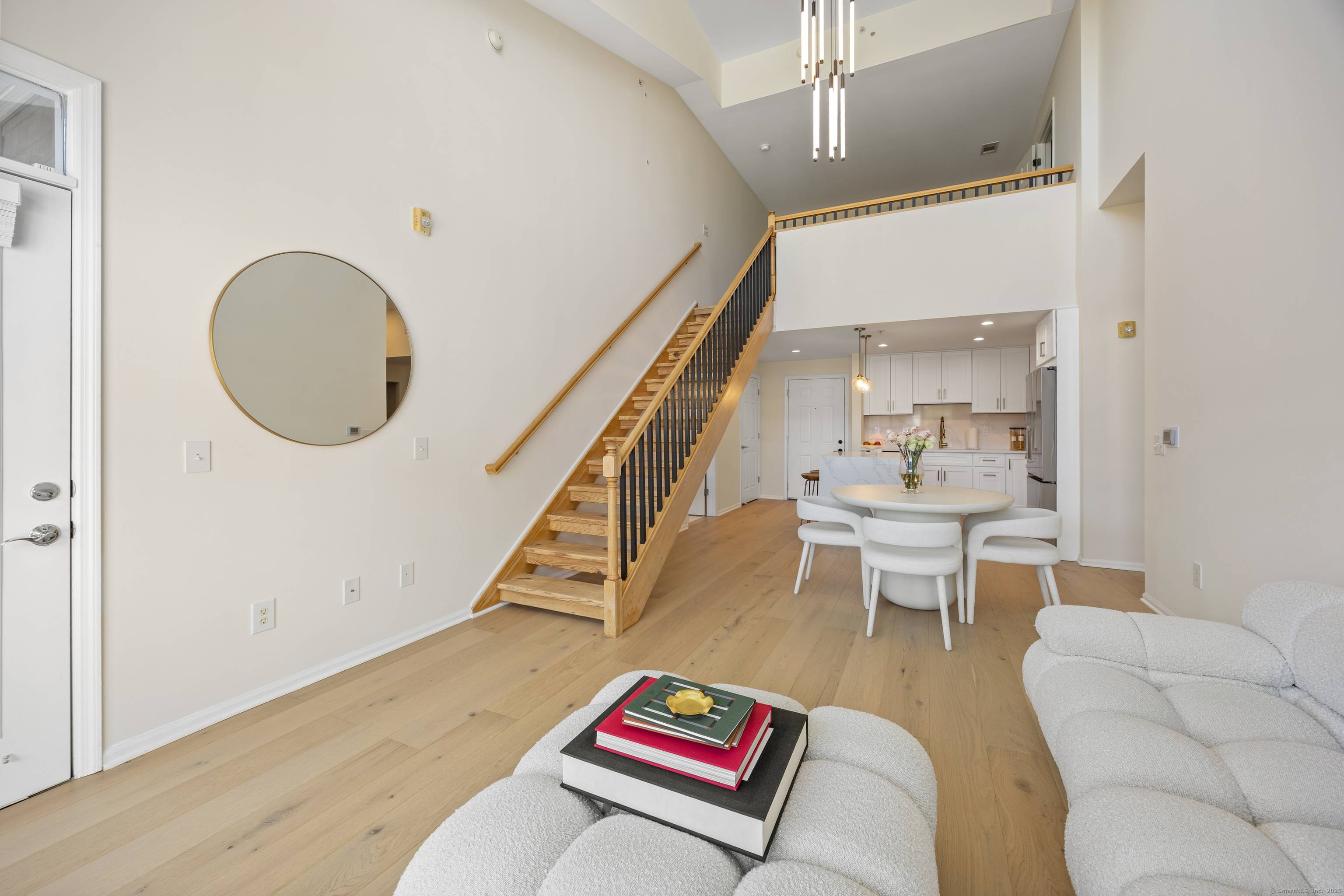 Welcome to this beautifully renovated 2 bedroom, 2 bath, 2 level luxury condo nestled in a meticulously maintained complex in Stamford, CT.