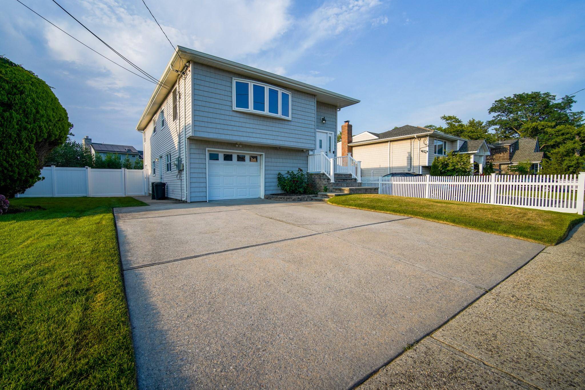 Welcome to this meticulously maintained and beautifully updated hi ranch, nestled in the heart of the picturesque Frederick Shores community of Babylon Village.