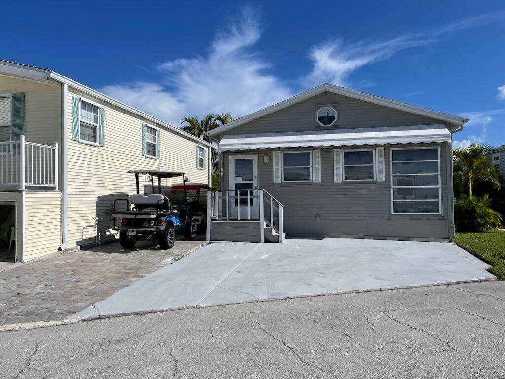 1188 Nettles Boulevard has a desirable great room floor plan with the living room, kitchen and dining area encompassed in one large room with 11 ft vaulted ceilings.
