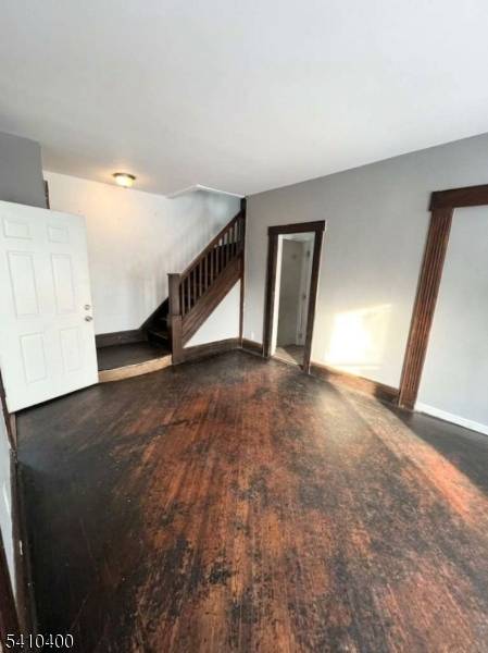 Huge corner lot single family home with 3 bedrooms, 3 full baths, and an additional room.