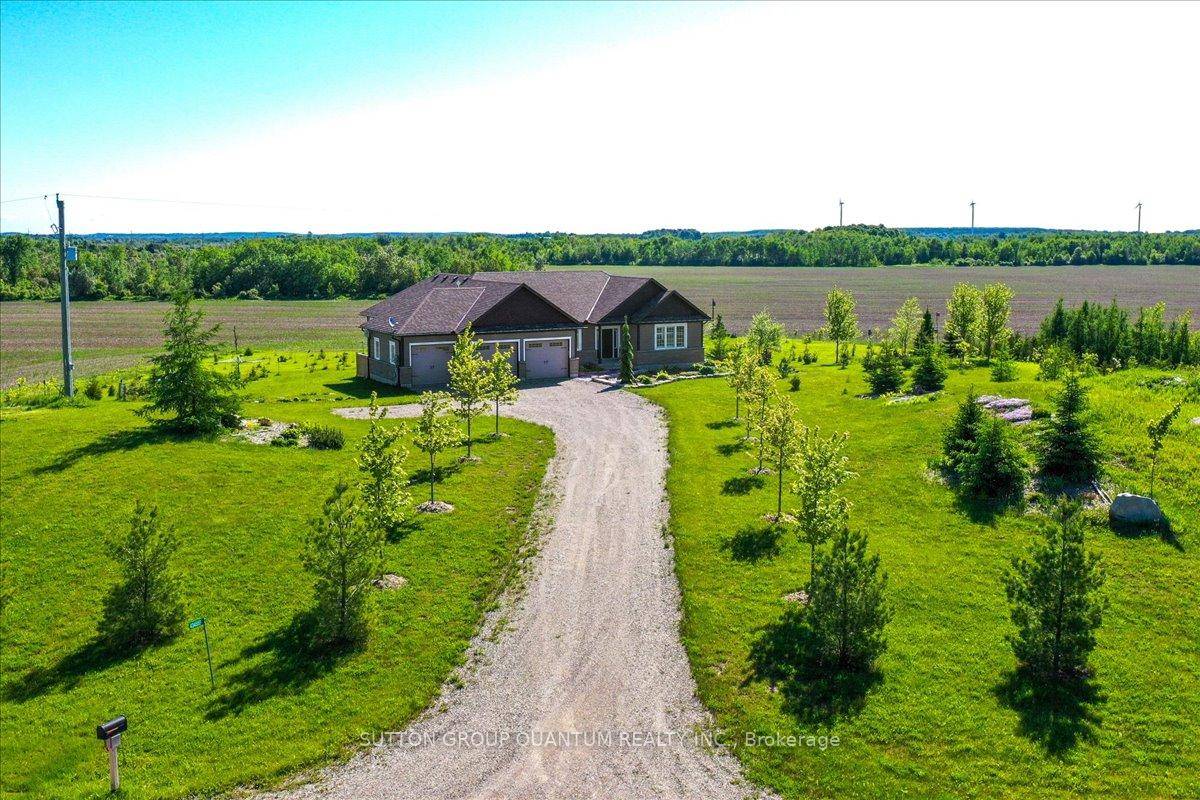 Your New Country Home is a Spectacular Open Concept Bungalow On Over 3 Professionally Landscaped Acres.