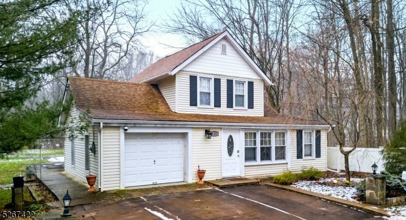 Charming Cape style home with modern updates awaits you !