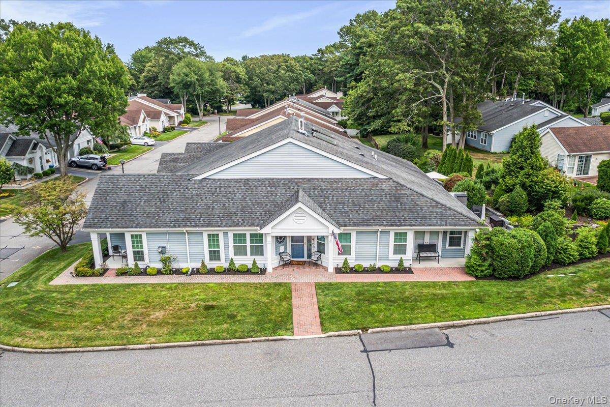 1 Huntington Court in Ridge, NY boasts a carefree, active lifestyle within the coveted The Glen 24 hour gated 55 community.
