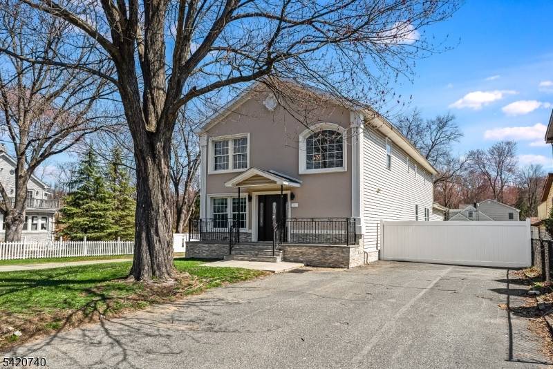 Spectacular in town location steps from downtown Denville and NJ Transit train station !