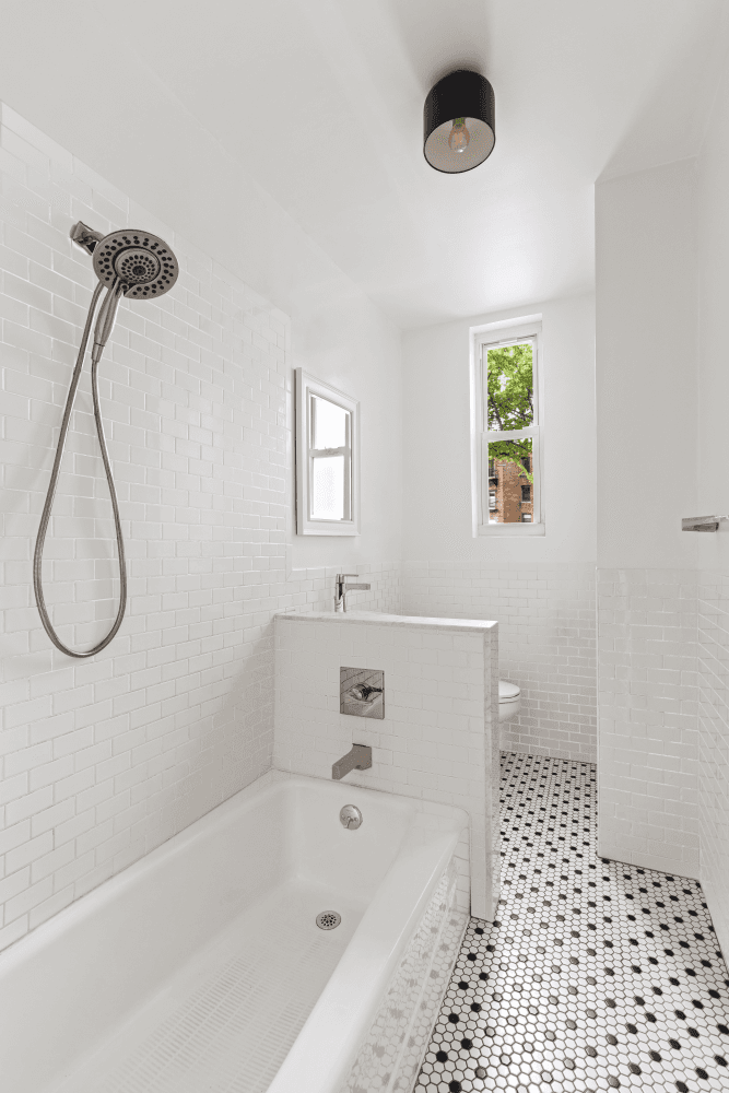 Bathed in golden southern light, this two bedroom, two bath co op marries classic Park Slope charm with bespoke contemporary design.