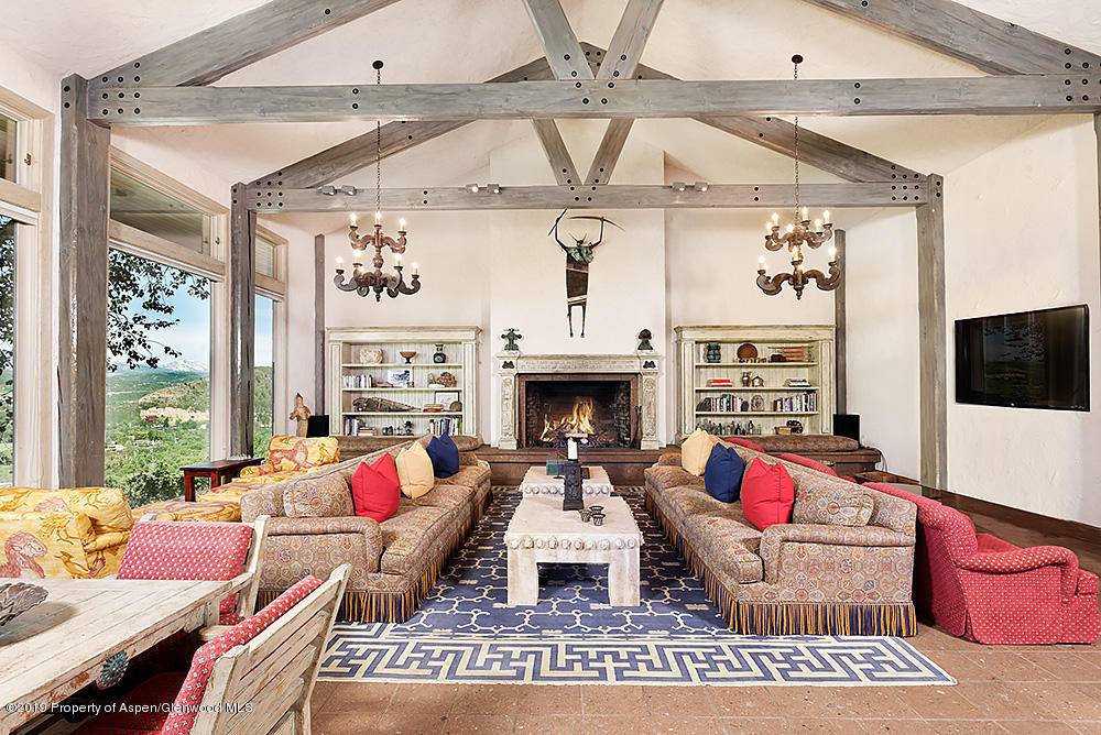 Located on the ridge of Red Mountain at the end of a quiet street, this home boasts the BEST views in Aspen with a short three minute drive to town.