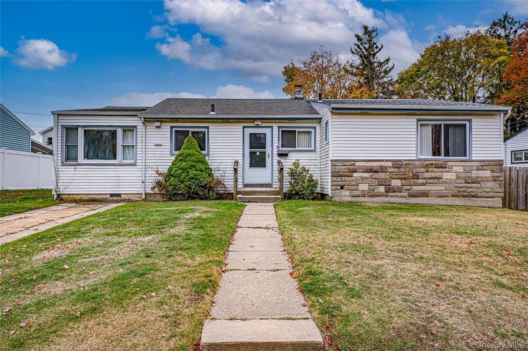 Professionally renovated, diamond condition ranch boasting beautiful bright kitchen and living room leading to a great backyard.