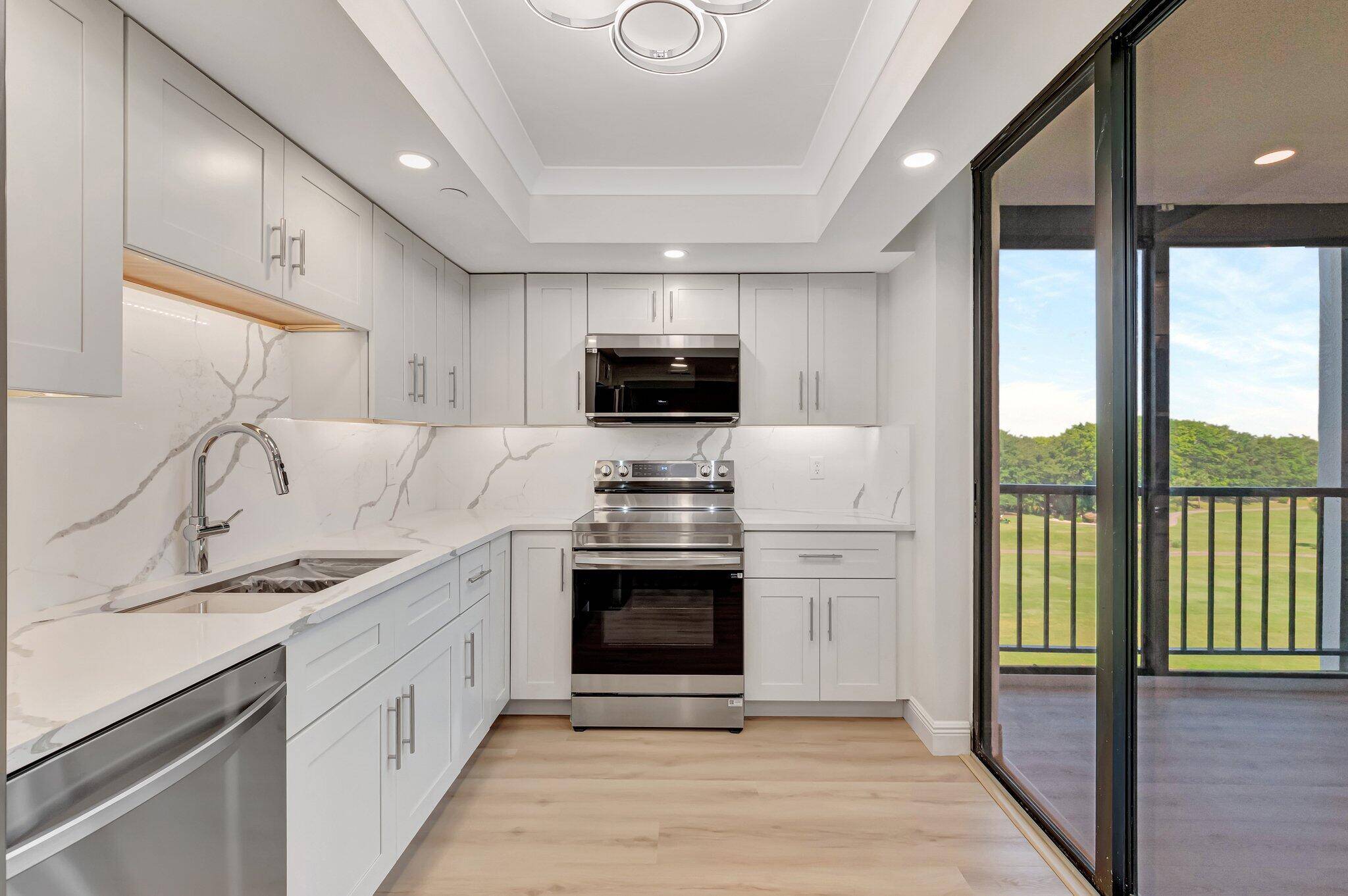 Move right into this brand new renovated corner unit.