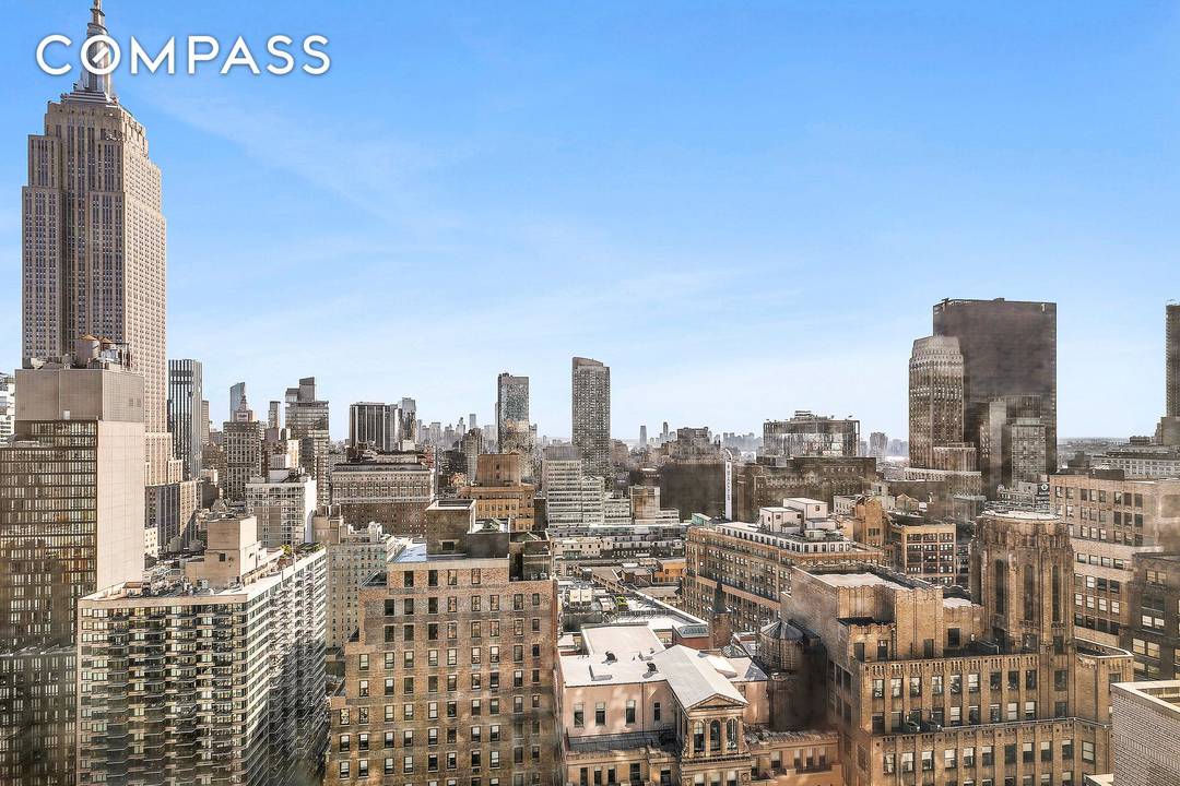 Sun Drenched Alcove Studio with Iconic Skyline Views at the Coveted Bryant Park Tower Condominium.