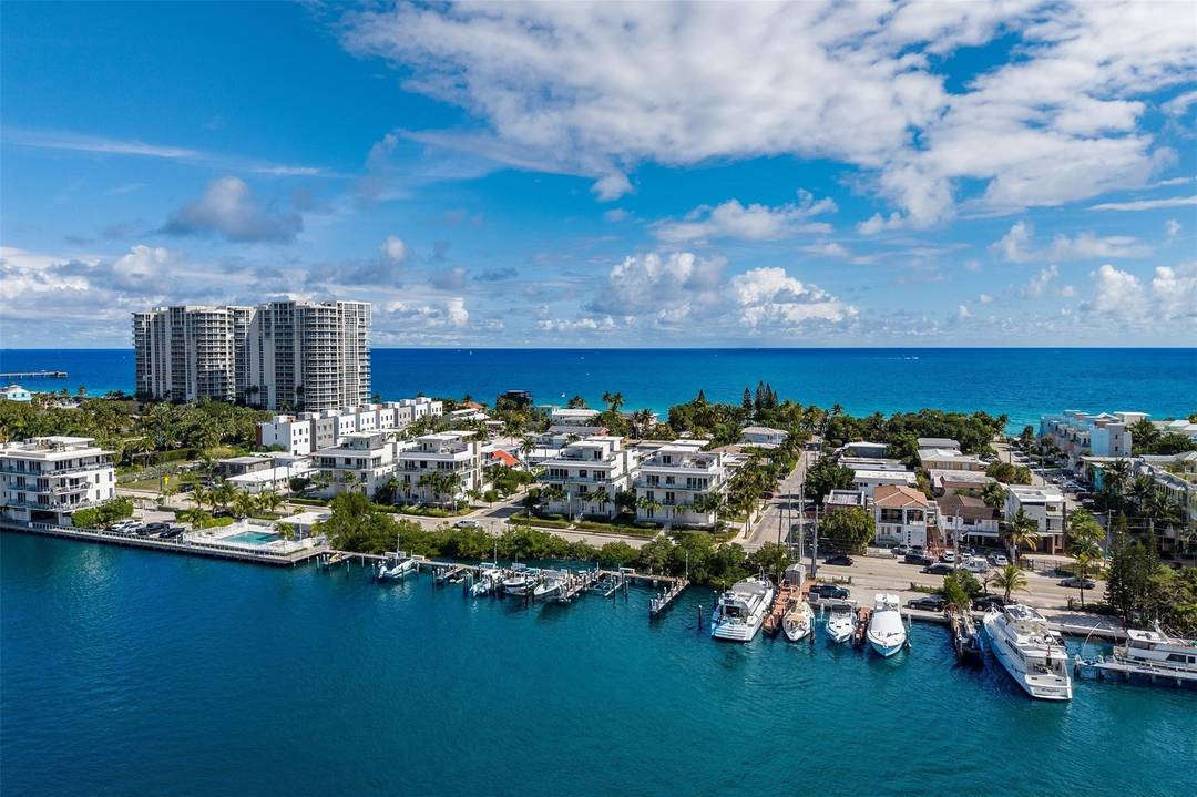 Newly built four story single family residence one block from the beach, offering a blend of modern design, privacy, and private boating.