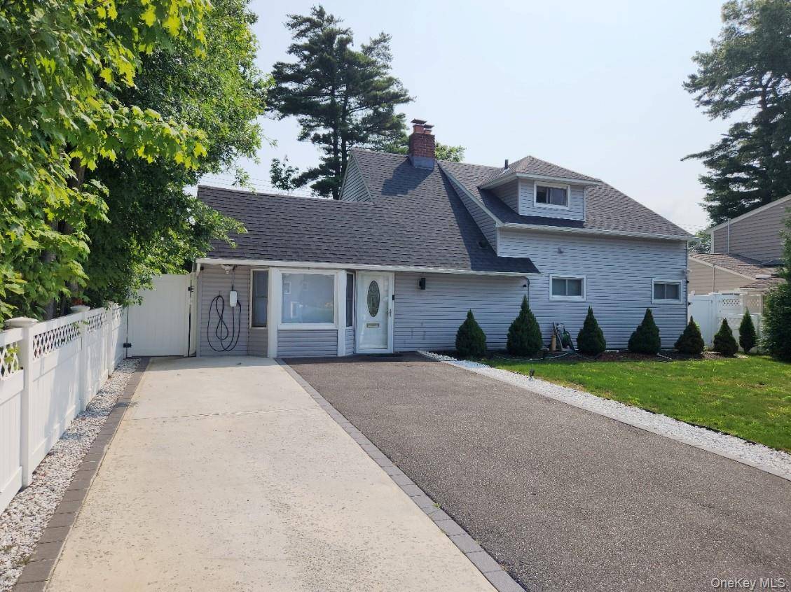 Move Right into This Recently Renovated Expanded Home with Huge Living Room, Formal Dining Room W FP, Newly Renovated EIK, 4 Bedrooms, 2 Full Baths, Laundry on 2nd Floor.