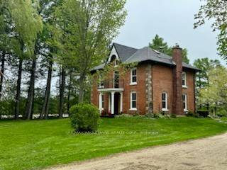 Park like setting on a quiet country road with a large renovated amp ; updated 5 bedroom Century home.